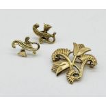 A 9ct gold brooch with floral detailing along with a matching pair of earrings, total weight 10.1g
