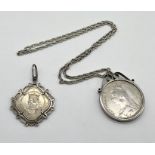 An 1889 crown in silver mount on silver chain along with a 1966 Guernsey 10 shilling coin in SCM