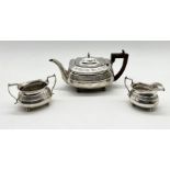 A hallmarked silver Georgian tea pot, London 1807 with a matched sugar and cream jug - Sheffield