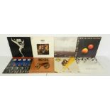 A collection of eight 12" rock vinyl records comprising of David Bowie - 'The Man Who Sold The