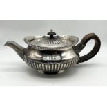 A Georgian silver tea pot, London 1802, weight 503.8g