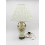 A classical design table lamp with brass base