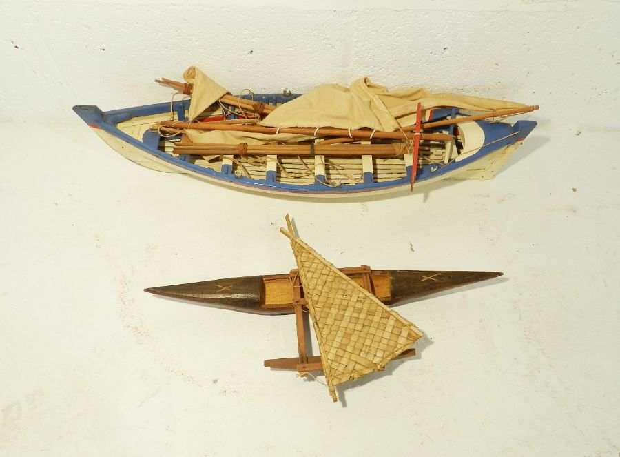 A model boat along with a tribal wooden model of an outrigger (A/F) - Image 2 of 6