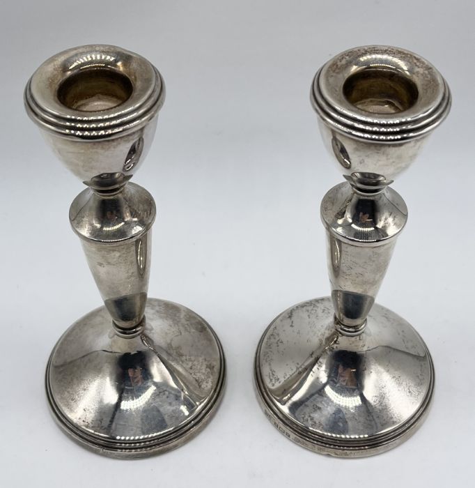 A pair of hallmarked silver candlesticks, height 14.5cm - Image 2 of 2