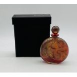 A boxed Isle of Wight studio glass scent bottle of compressed globe form with everted rim by Michael