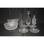 A collection of glassware including bowls, decanters, salts and a funnel
