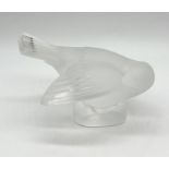 A Lalique figure of a sleeping bird - signed to base