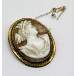 A 9ct gold cameo brooch with safety chain