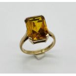 A 9ct gold and topaz ring