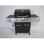 An Outback Apollo 4 Burner Gas barbeque