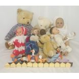 A collection of vintage dolls and soft toys including Winnie The Pooh, limited edition Gund teddy