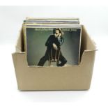 A quantity of 12" vinyl records including Michael Jackson, Frankie Goes To Hollywood, Wings, Elton