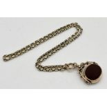A Victorian 9ct gold swivel fob set with agates on a 9ct gold chain (chain weight approx. 12.9g)