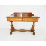 A Victorian mahogany hall table with two drawers raised on turned legs - length 100cm, depth 50cm,