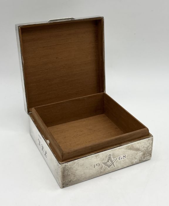 A silver cigarette box with engine turned decoration and Masonic symbol to front, dated 1968 - Image 4 of 4