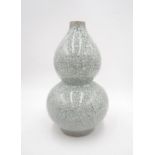 A Celadon crackle-glazed double gourd vase with incised mark to base - height 30cm
