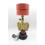 A table lamp with painted metal base in the form of an eagle - total height 59cm