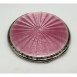 A silver and pink guilloche enamelled compact