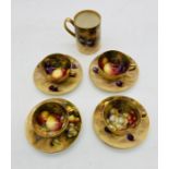 A set of four Royal Worcester miniature cups and saucers, the interior of the cup and the saucer