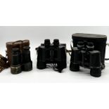 A collection of binoculars including early 19th pair in leather case, Super Zenith 7 x 50 field