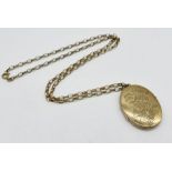 A 9ct gold (tested) locket on 9ct chain, weight of chain 13.5g