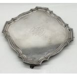 A hallmarked silver salver weight 1053g (33.855 troy ounces)