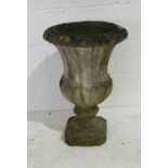 A reconstituted stone garden urn - height 68cm
