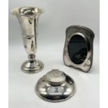 A silver vase, capstan inkwell and photo frame- all hallmarked