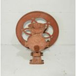 An antique painted grain grinder, marked 'Meech's Surprise'