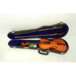 A Yamada violin with two bows and carry case