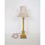 A brass Corinthian column table lamp