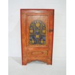 An Indian folk art style painted cupboard with single drawer under - length 56cm, depth 29cm, height