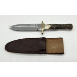 A Joseph Rodgers hunting knife with leather sheath and antler handle - length of blade 12cm