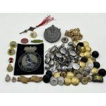 A collection of badges and buttons including British Railways, Royal Pigeon Racing Association etc.