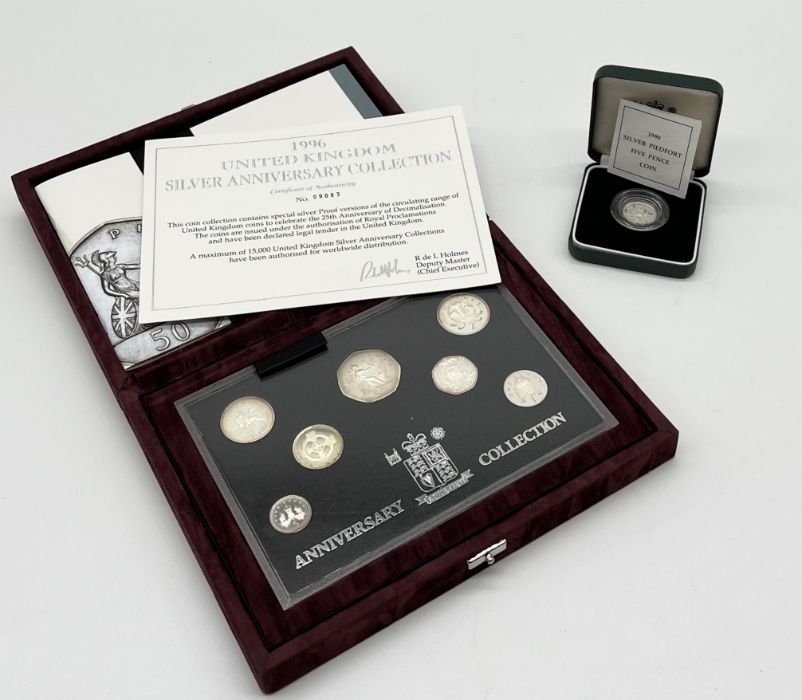 Royal Mint 1996 United Kingdom cased Silver Anniversary collection along with a 1990 5p Silver