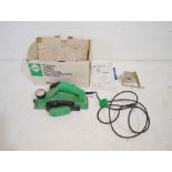 A Wickes 450W tile cutting saw with original box and instructions, a Hitachi Koki P20SA planer