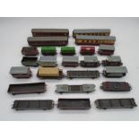 A collection of Hornby OO gauge model railway rolling stock and carriages including oil tankers, LMS