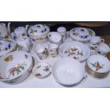 A large collection of Royal Worcester Evesham pattern including tureens, hors d'oeuvres plate,