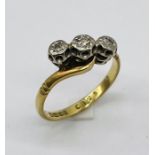 An 18ct gold diamond three stone ring