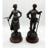 A pair of Spelter figures "Faneuse" and "Faucheur" by Bruchon and signed to base