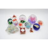 A collection of glass paperweights etc.