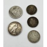 A small collection of silver coinage including a 1922 Peace Dollar, 1921 Morgan Dollar, 1840