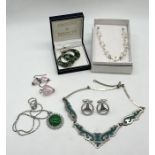 A small collection of costume jewellery including 925 silver