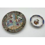 A Chinese Famille Rose plate along with a smaller Dresden dish