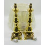 A pair of brass lamps, along with two new Abbey Pencil Pleat lampshades