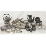 A collection of silver plated and pewter items including teapots, jugs etc.