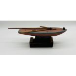 A vintage small Star pond yacht on stand - length 37cm