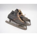 A vintage pair of ice skates marked 'Gillberg & Co, Stockholm', size 46