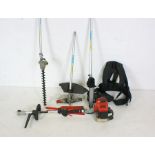 An Axminster Tool Centre J260 petrol multitool with strimmer, chainsaw, hedge trimmer attachments