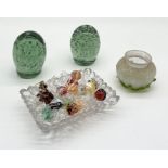 A collection of glassware including two glass dump paperweights, collection of art glass sweets